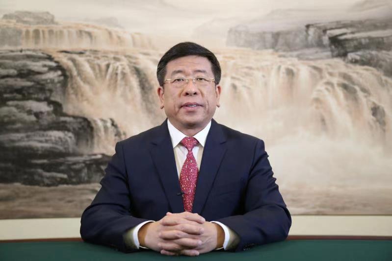 国务院国资委副主任任洪斌在论坛开幕式